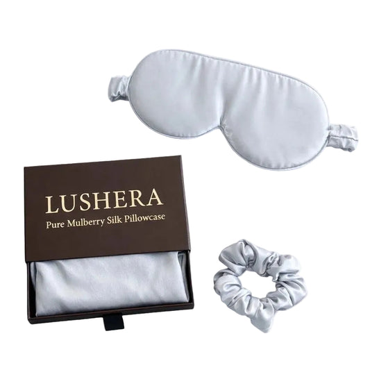 Silk eye mask, scrunchie, and Lushera packaging on a white background
